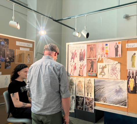 A person looking at a artwork