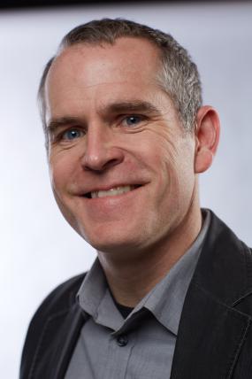 Headshot of Christopher Goodson.