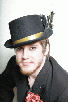 Spencer Hamp as Macheath