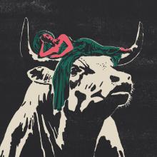 Bull with woman laying across horns