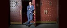 David Armstrong stands at the front doors of the 5th Avenue Theater.