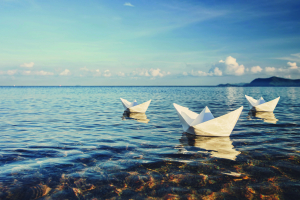 Paper boats on an ocean