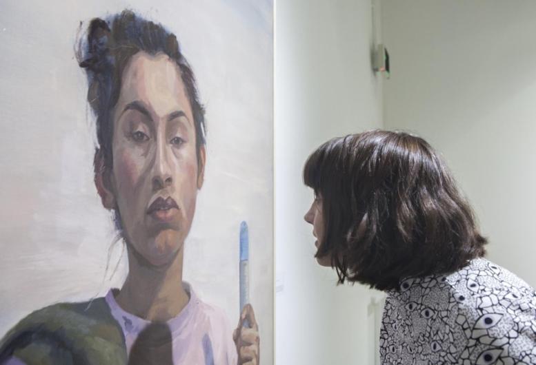 student analyzes a painting 