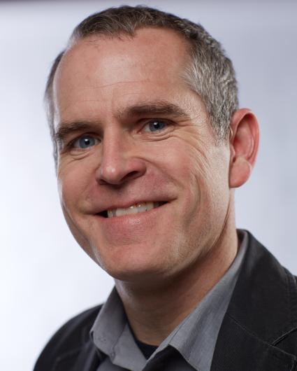 Headshot of Christopher Goodson.