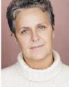 Amy Thone in white turtleneck