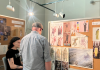 A person looking at a artwork
