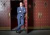 David Armstrong stands at the front doors of the 5th Avenue Theater.