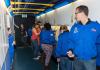 Magelssen (R) and crew mates suit up at the Museum of Flight’s Challenger Learning Center.