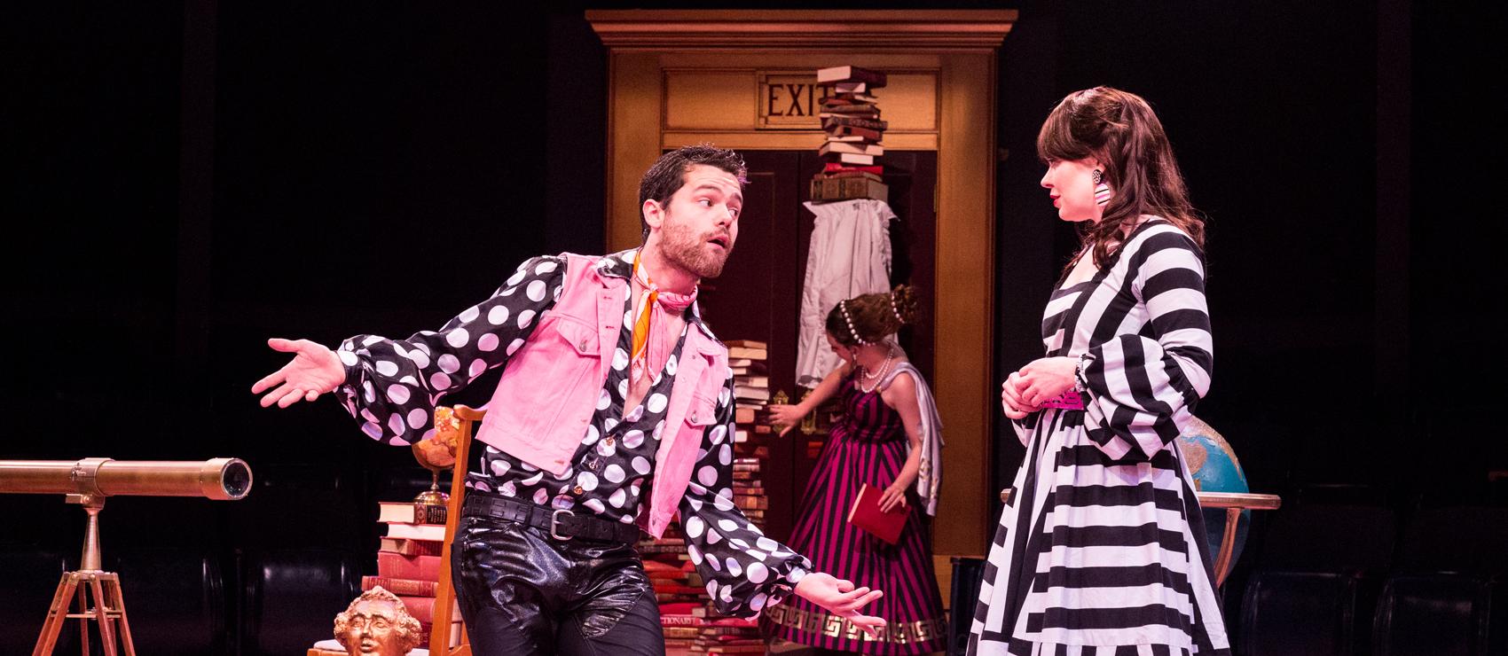 Two actors performing on stage
