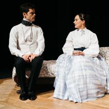 Ada and the Engine / Photo by Logan Guerrero Man and woman sit next to eachother