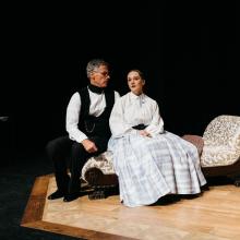 Ada and the Engine / Photo by Logan Guerrero Woman and older man sit on couch together