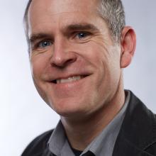 Headshot of Christopher Goodson.